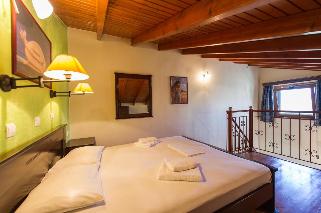 Postel nebo postele na pokoji v ubytování Villa Alexandros