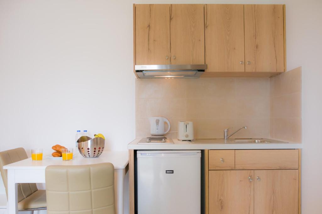 Kuchyň nebo kuchyňský kout v ubytování Stellar Apartments I