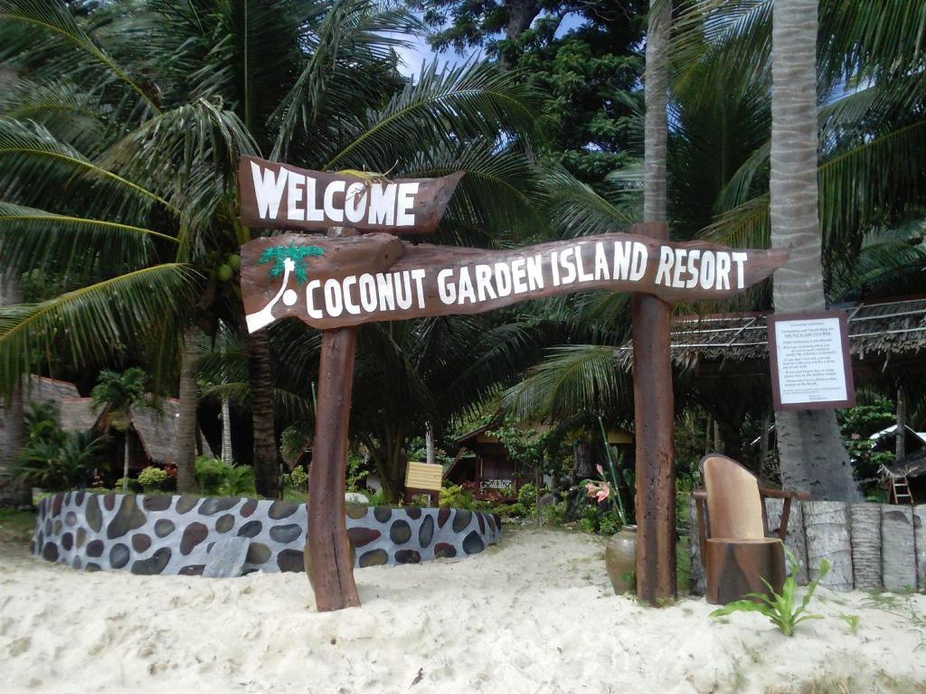 Et logo, certifikat, skilt eller en pris der bliver vist frem på Coconut Garden Island Resort