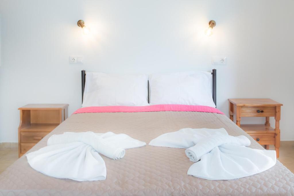 Postel nebo postele na pokoji v ubytování Stellar Apartments I