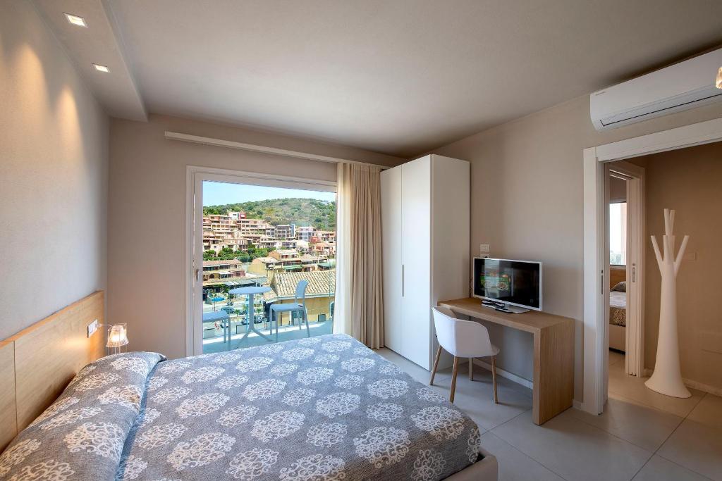 Postel nebo postele na pokoji v ubytování Domu Simius Life Style Hotel