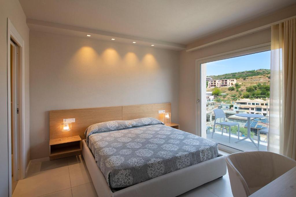 Postel nebo postele na pokoji v ubytování Domu Simius Life Style Hotel