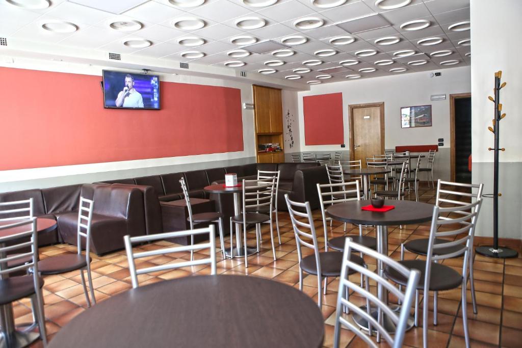 Restauracja lub miejsce do jedzenia w obiekcie Albergo Gusmeroli