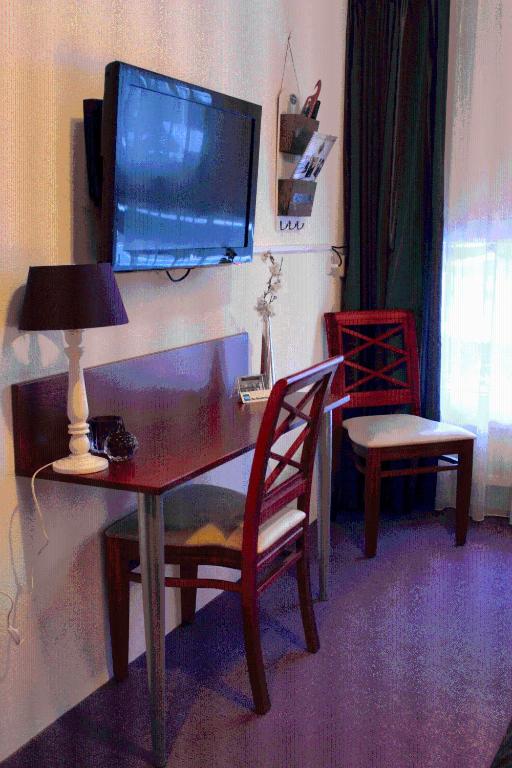 TV a/nebo společenská místnost v ubytování Parkhotel Hugo de Vries