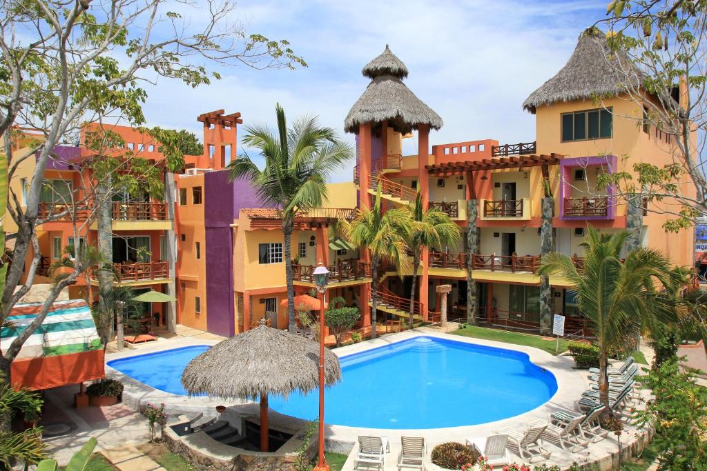an image of a resort with a swimming pool at Villas Dulce Suenos in Rincon de Guayabitos