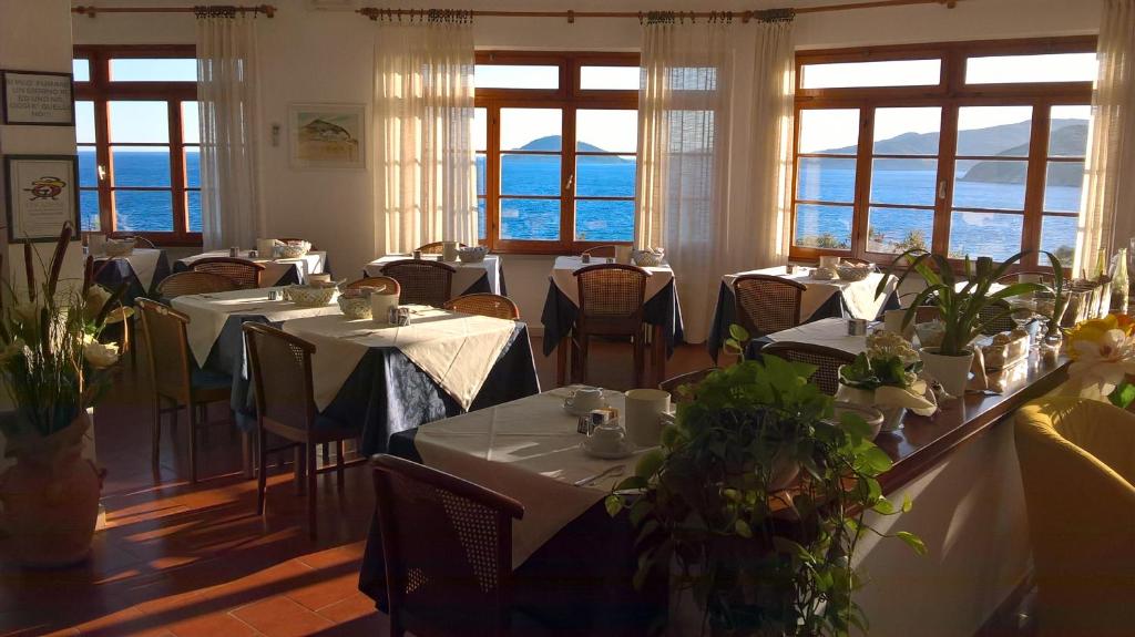 Restaurace v ubytování Albergo Le Briciole