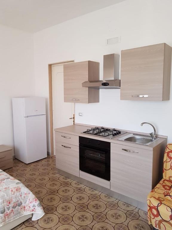 Кухня или мини-кухня в Sea Salento Casa Vacanze
