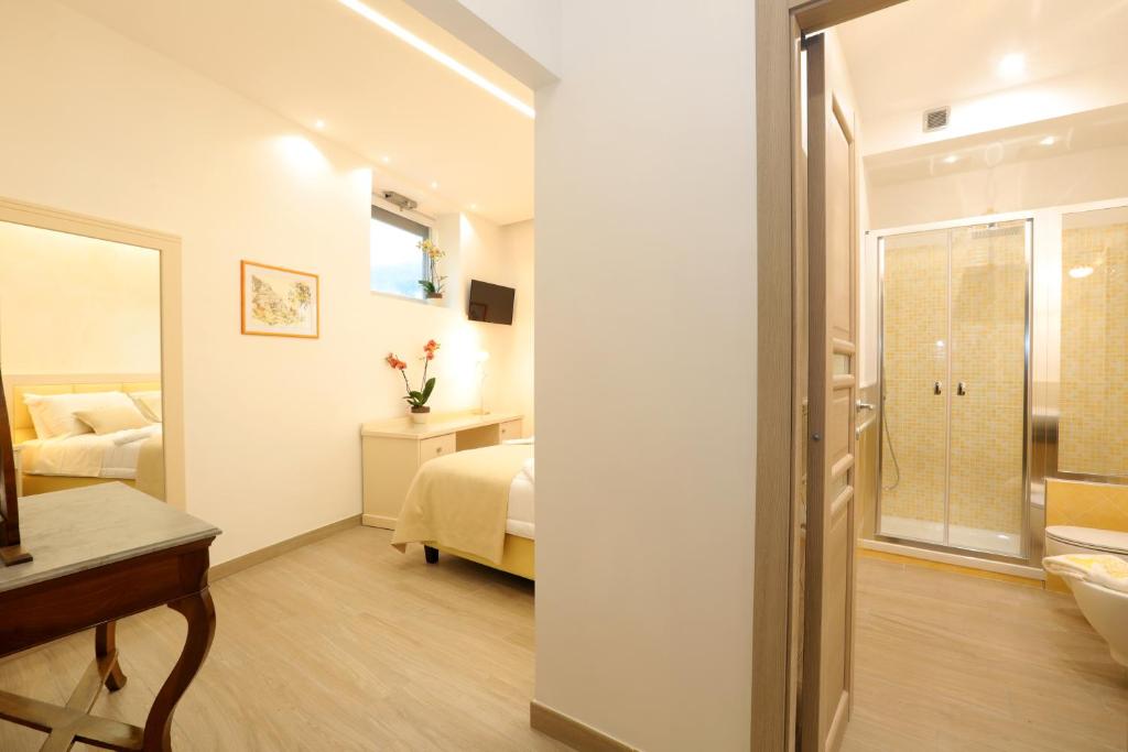 Łóżko lub łóżka w pokoju w obiekcie Relais Ohana - De Vivo Realty