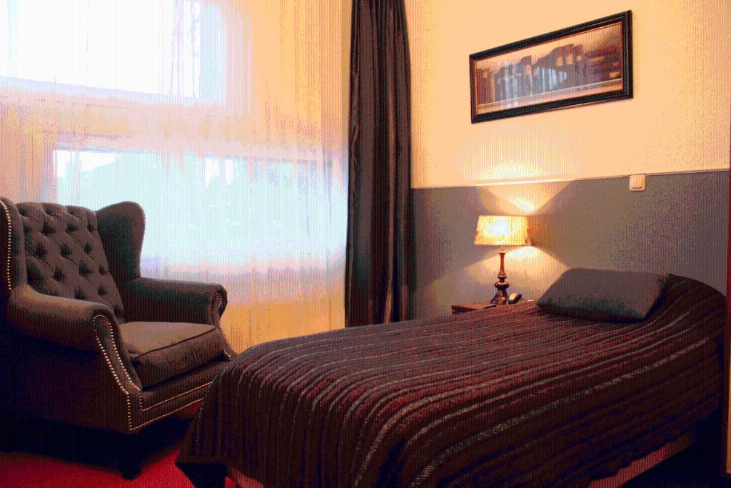 Postel nebo postele na pokoji v ubytování Parkhotel Hugo de Vries