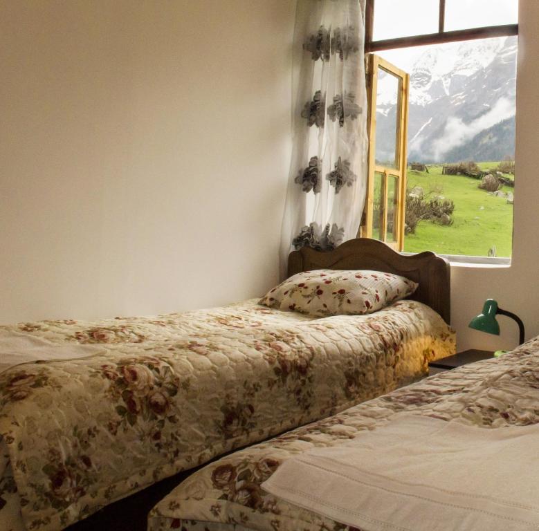 Postel nebo postele na pokoji v ubytování Peak Mazeri Guest House