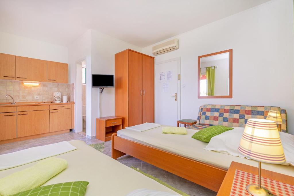 Posteľ alebo postele v izbe v ubytovaní Sunny House Free Parking