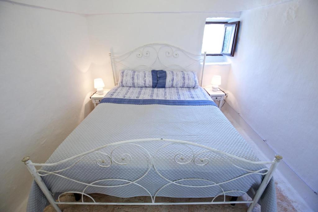 Postel nebo postele na pokoji v ubytování B&B Tenuta Ranieri
