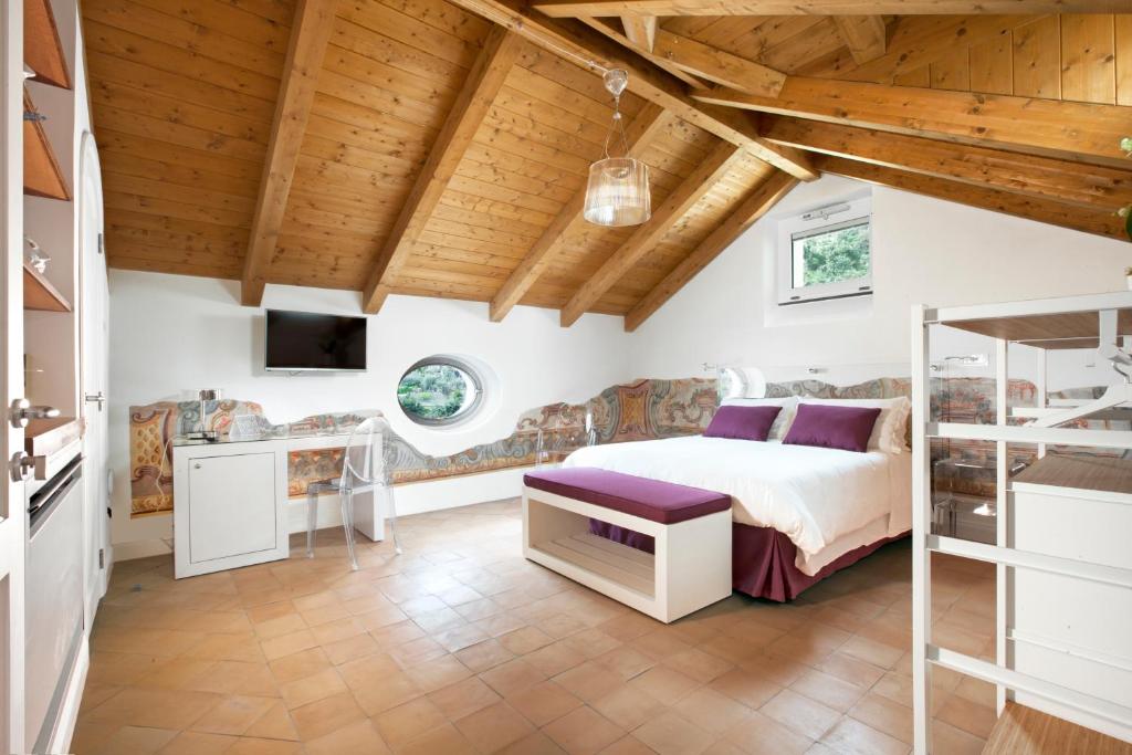 Postel nebo postele na pokoji v ubytování Il Moro Di Positano