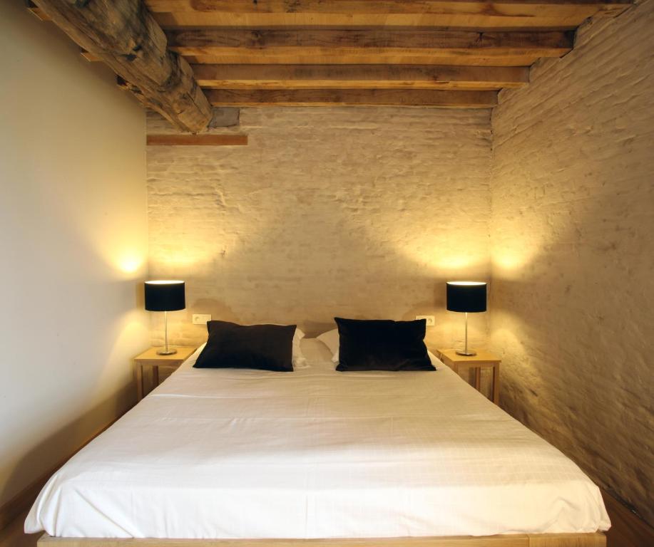 Postel nebo postele na pokoji v ubytování 'S Hertogenmolens Hotel