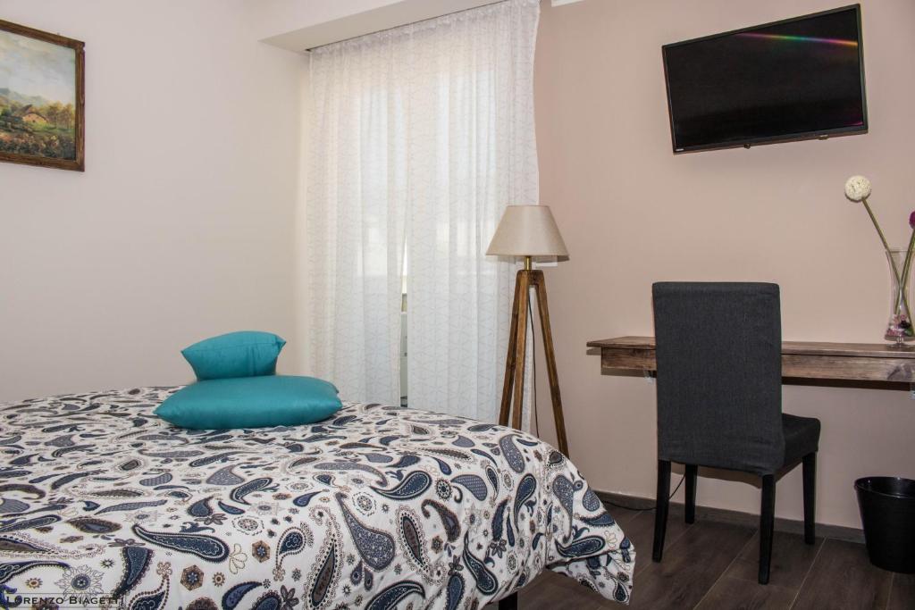 Postel nebo postele na pokoji v ubytování B&B Geolja
