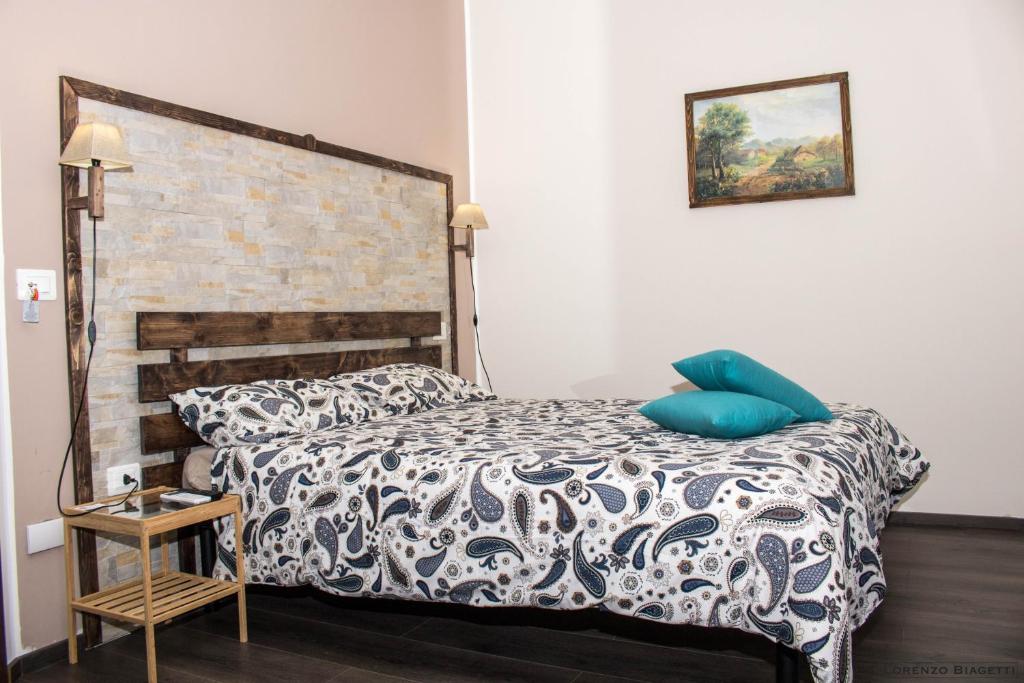 Postel nebo postele na pokoji v ubytování B&B Geolja