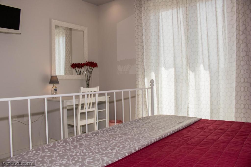 Postel nebo postele na pokoji v ubytování B&B Geolja