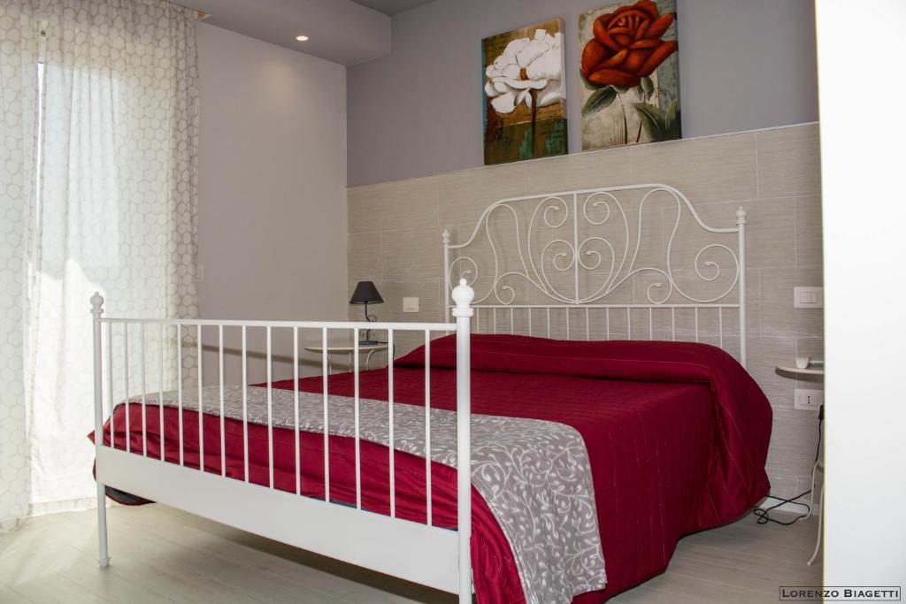 Postel nebo postele na pokoji v ubytování B&B Geolja