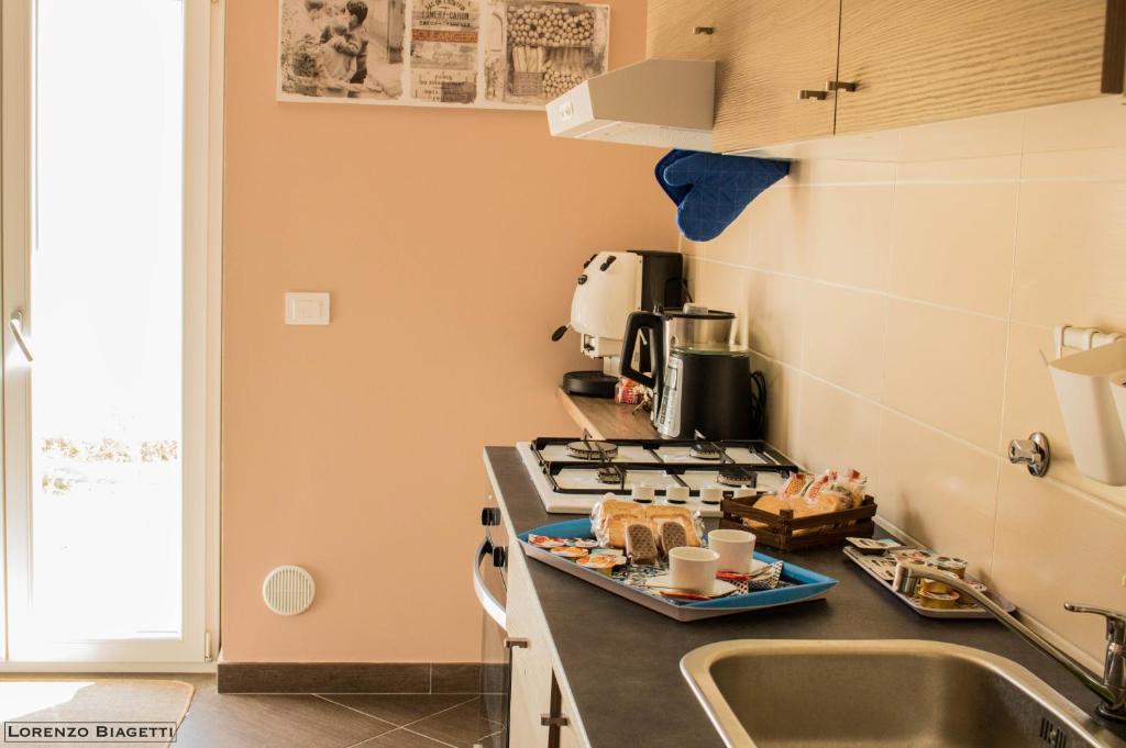 Kuchyň nebo kuchyňský kout v ubytování B&B Geolja