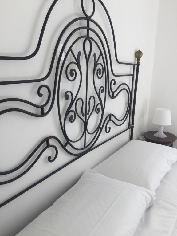 Postel nebo postele na pokoji v ubytování B&B Casa Del Priore