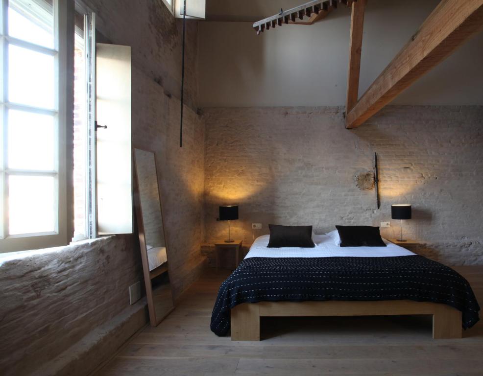 Postel nebo postele na pokoji v ubytování 'S Hertogenmolens Hotel