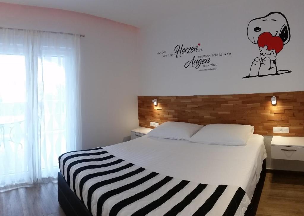 Posteľ alebo postele v izbe v ubytovaní Apartments Ursic MB