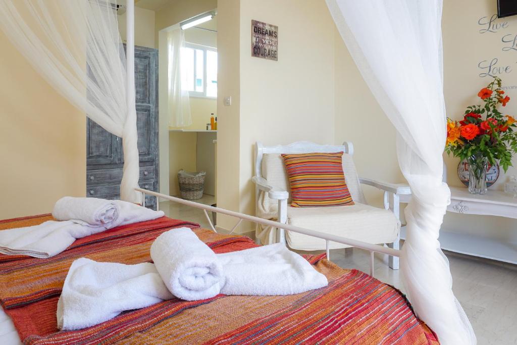 Postel nebo postele na pokoji v ubytování Cubaneros Holiday Inn