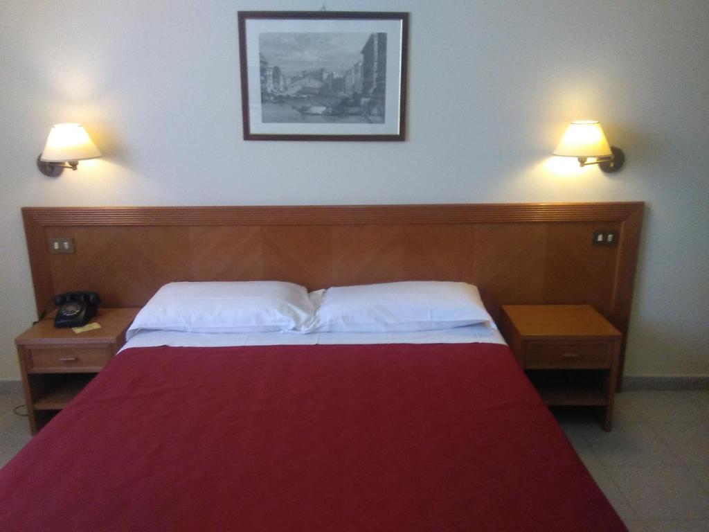 Postel nebo postele na pokoji v ubytování Hotel il Focolare