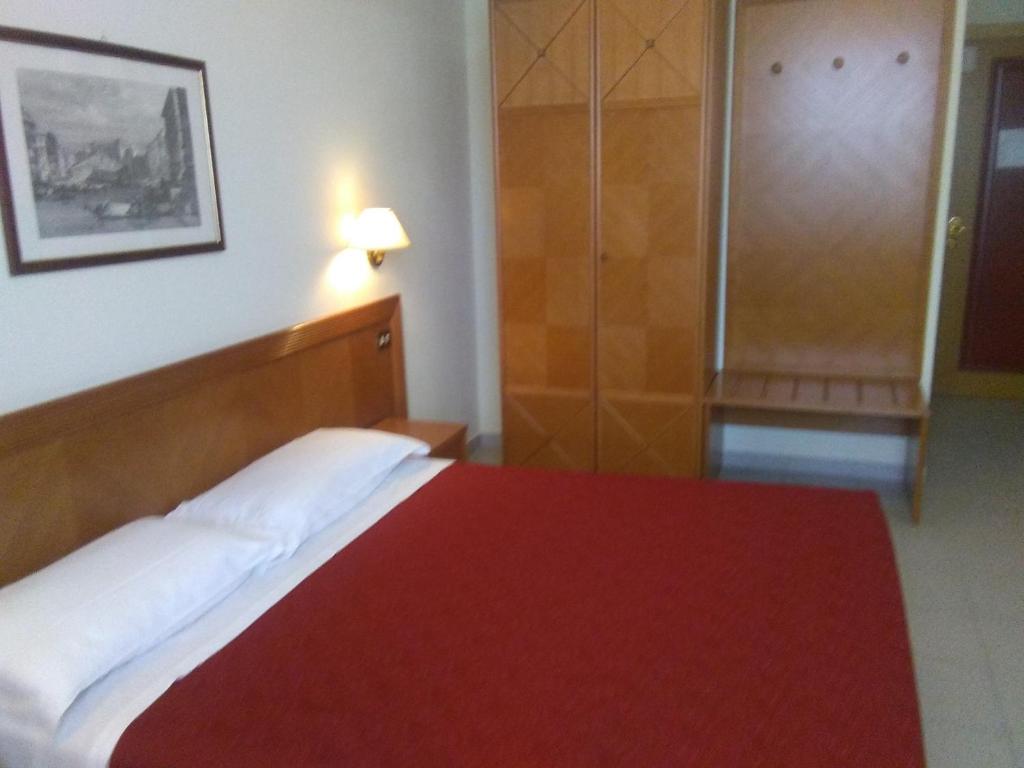 Postel nebo postele na pokoji v ubytování Hotel il Focolare