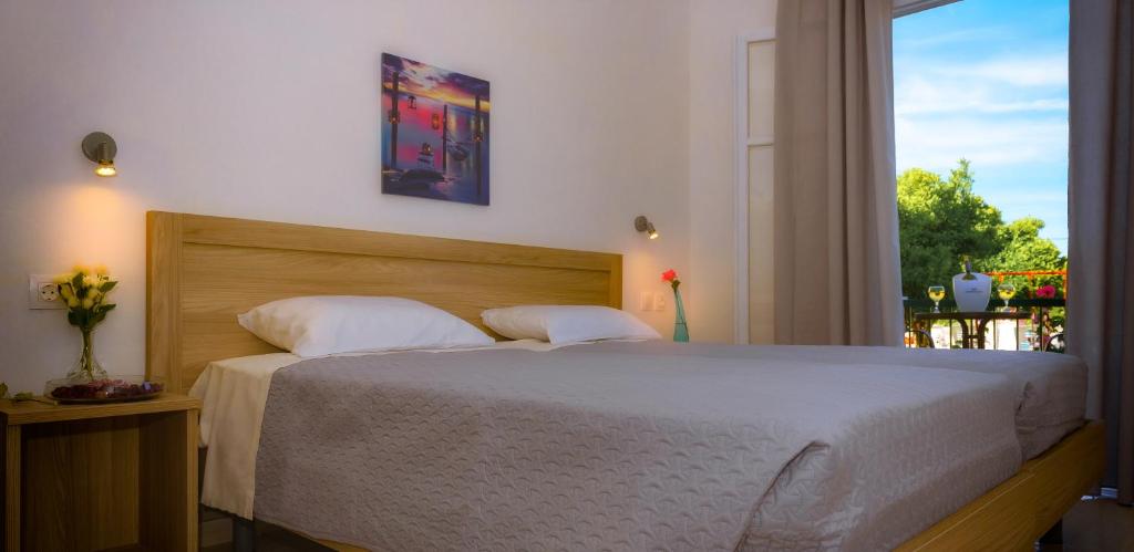 Postel nebo postele na pokoji v ubytování Yianetta Hotel Apartments