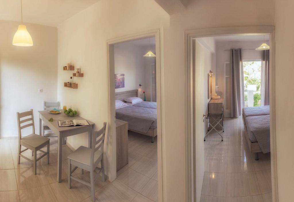 Postel nebo postele na pokoji v ubytování Yianetta Hotel Apartments