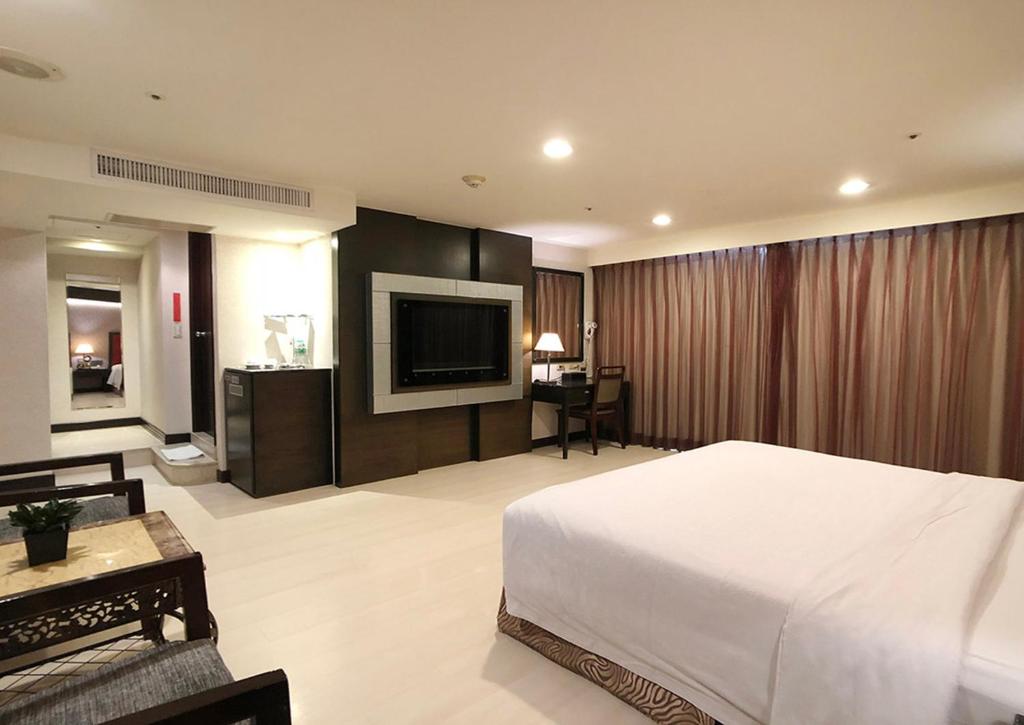 TV a/nebo společenská místnost v ubytování Shihzuwan Hotel – Kaohsiung Station