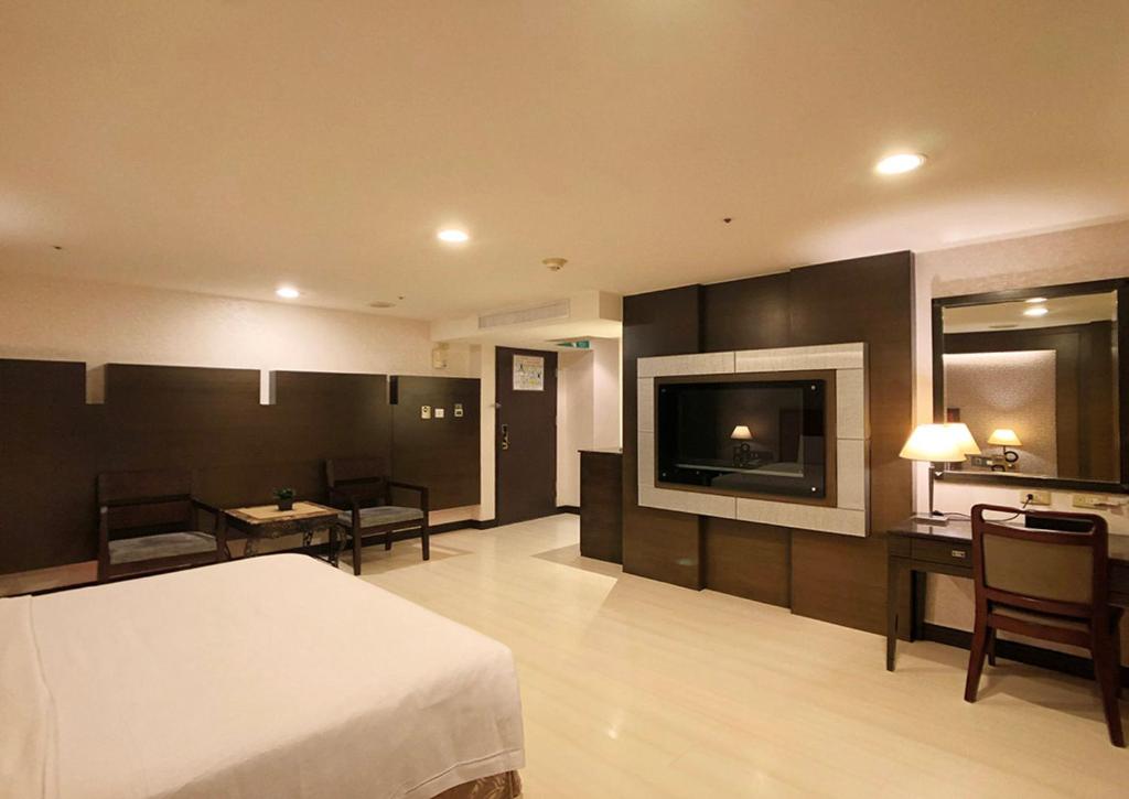 TV a/nebo společenská místnost v ubytování Shihzuwan Hotel – Kaohsiung Station