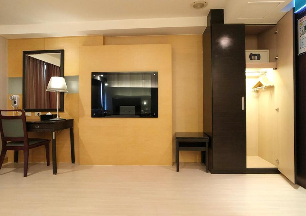 TV a/nebo společenská místnost v ubytování Shihzuwan Hotel – Kaohsiung Station