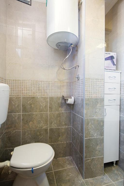 Kúpeľňa v ubytovaní Apartman Kunjić