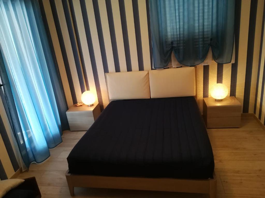Posteľ alebo postele v izbe v ubytovaní Affittacamere Massimo D'Azeglio