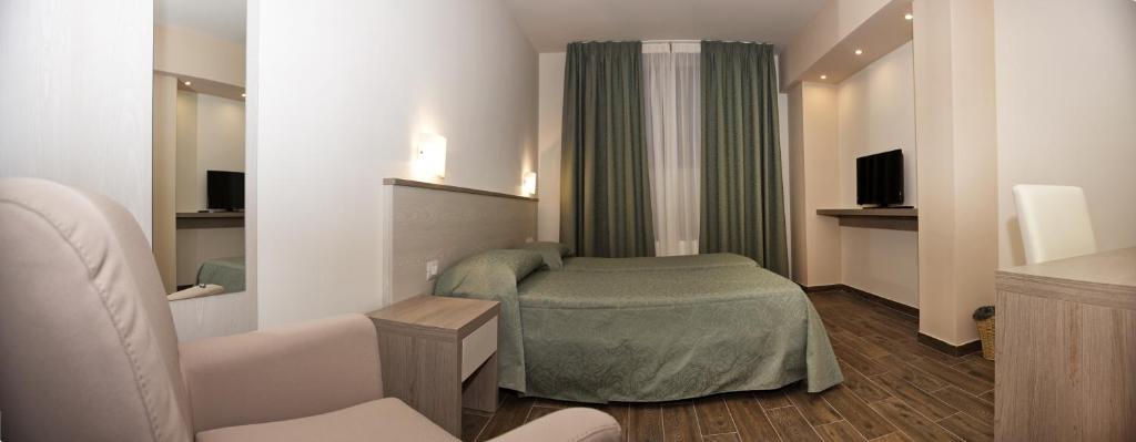 Televízia a/alebo spoločenská miestnosť v ubytovaní B&b Amiata