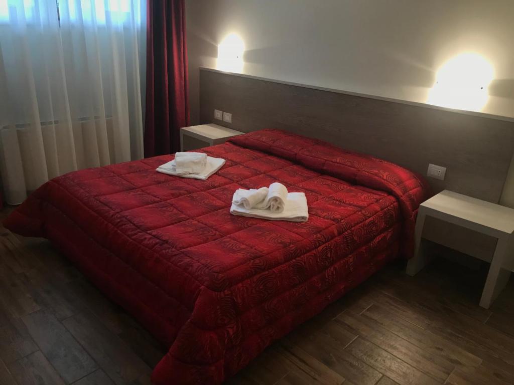 Posteľ alebo postele v izbe v ubytovaní B&b Amiata