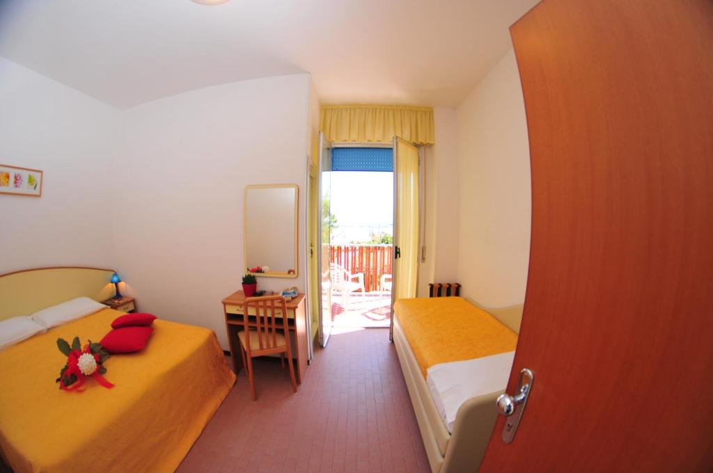 Postel nebo postele na pokoji v ubytování Hotel Antares