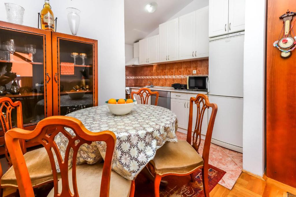 Kuchyň nebo kuchyňský kout v ubytování Apartment Mario