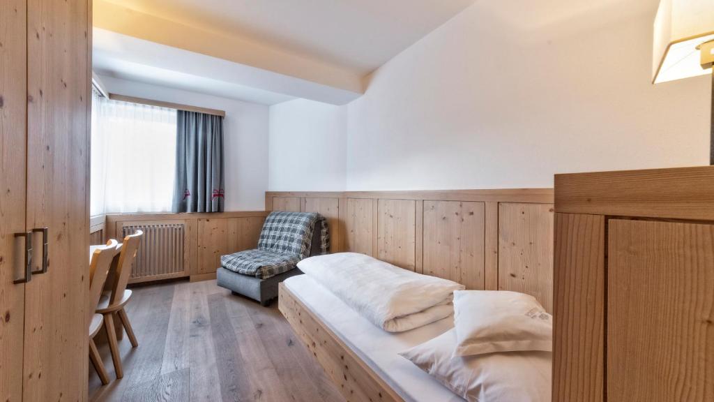 Postel nebo postele na pokoji v ubytování Hotel Villa Monica