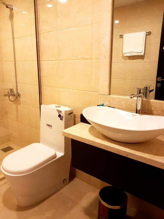 Koupelna v ubytování Tanuf Residency Hotel