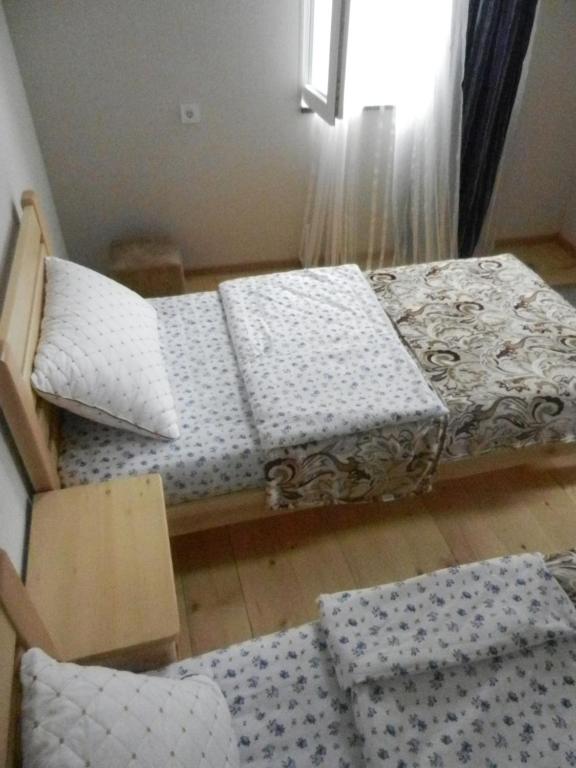 Postel nebo postele na pokoji v ubytování guest house katia tbilisi