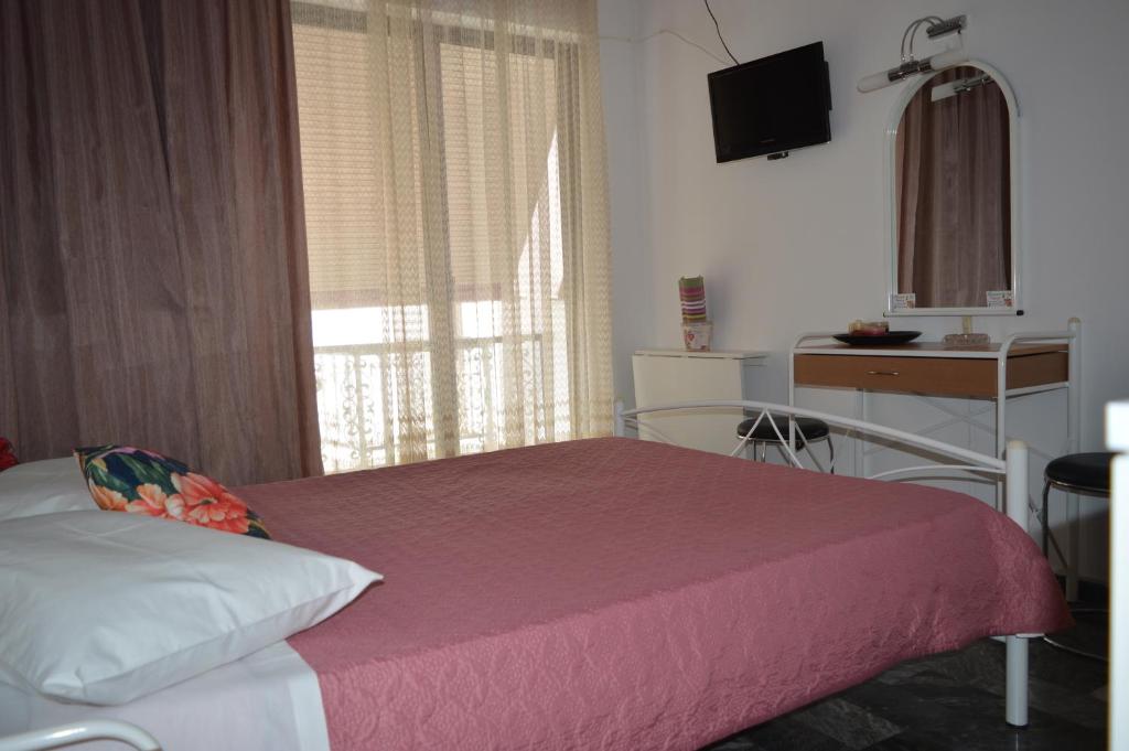 Zdjęcie z galerii obiektu Nancy Rooms w mieście Skala Kallonis