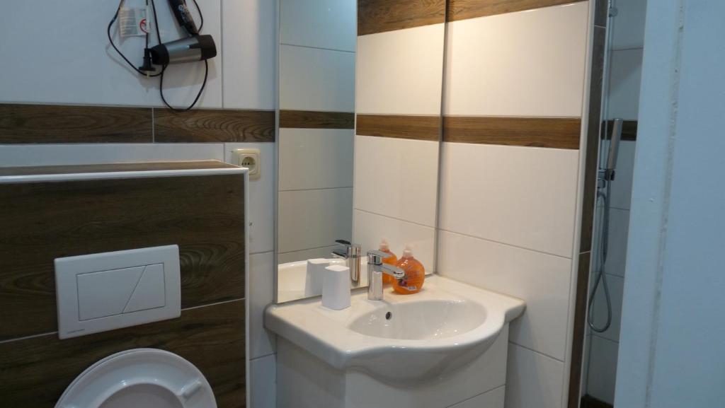 Koupelna v ubytování Hotel Rodizio UG