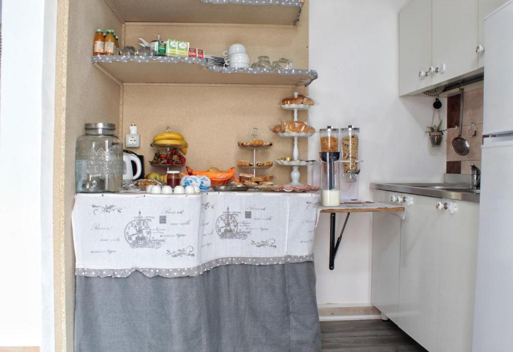 Kuchyň nebo kuchyňský kout v ubytování B&B Verzavò