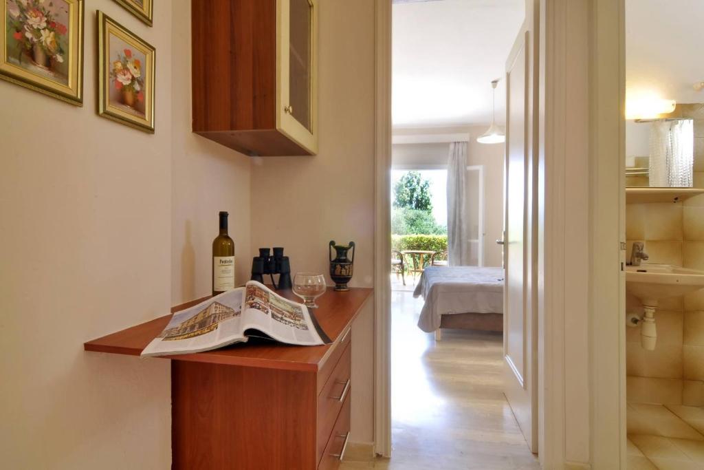 Postel nebo postele na pokoji v ubytování Veroniki Studios & Apartments