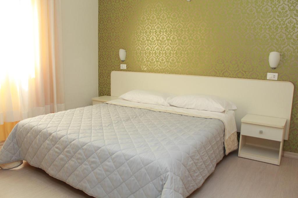 Llit o llits en una habitació de Hotel Stella Polare