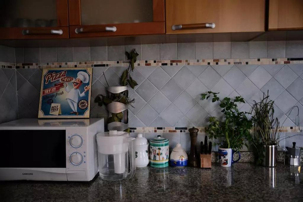 Kuchyň nebo kuchyňský kout v ubytování Lemontree House Bacoli