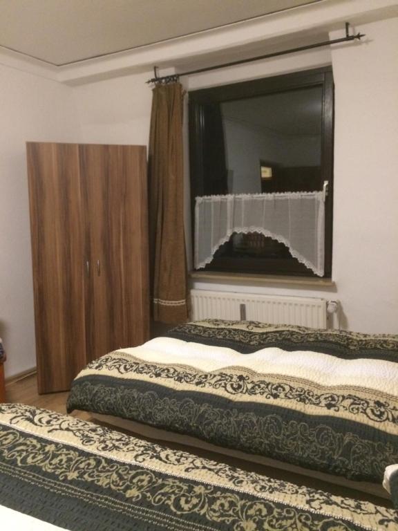 Postel nebo postele na pokoji v ubytování Abels Appartements